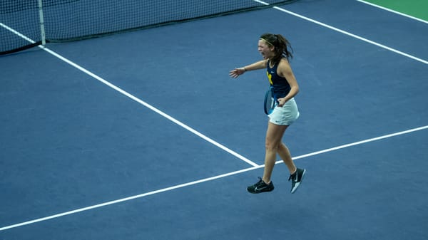 Tennis player Julia Fliegner celebrates a point at the ITA Indoor National Championship.