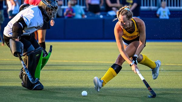 Lora Clark of Michigan Field Hockey squares up to shoot vs. Michigan State.